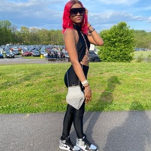 Black jump suit with chains size small